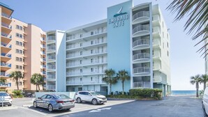 A multi-story hotel with a prominent sign reading "Emerald Skye." - Emerald Skye 54 (Orange Beach)