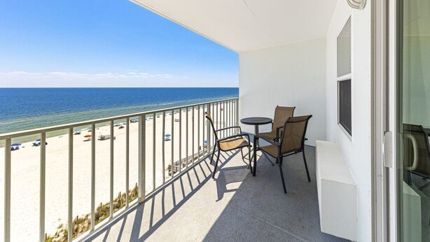 A balcony with a view of the beach and ocean. - Emerald Skye 54 (Orange Beach)