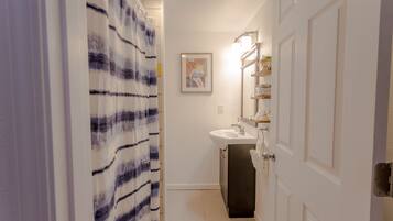 Hair dryer, towels, soap, shampoo