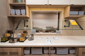Free daily self-serve breakfast