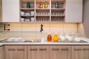 Free daily self-serve breakfast