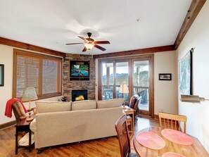 Flat-screen TV, fireplace