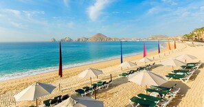 On the beach, sun loungers, beach towels