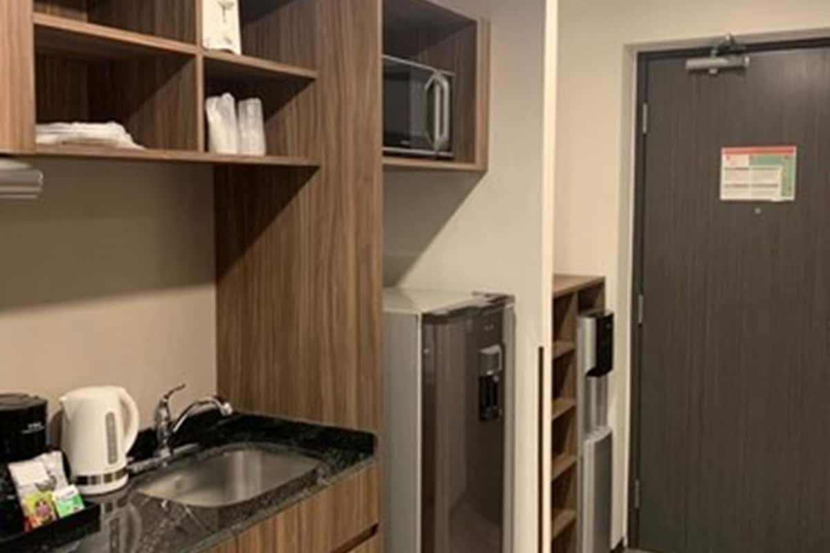 premium room one queen bed | private kitchen | coffee/tea maker, electric kettle