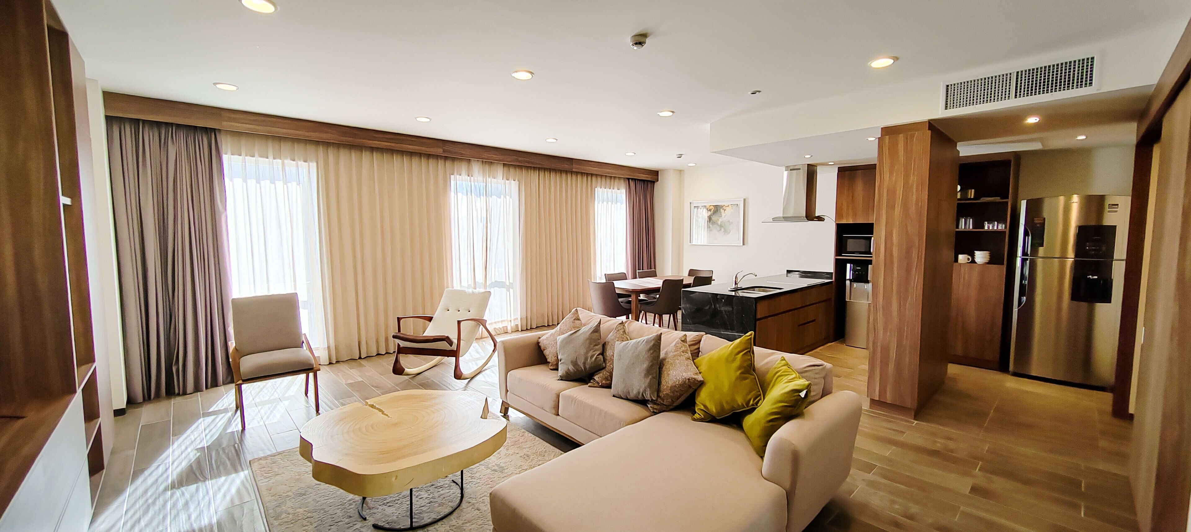 presidential suite, multiple beds, non smoking | living area | 49-inch tv with cable channels