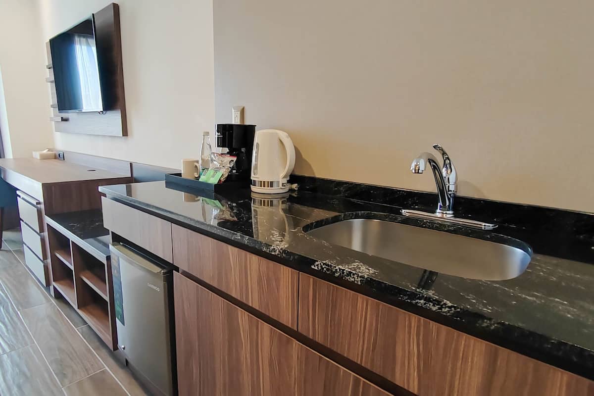 deluxe room, multiple beds, non smoking | 1 bedroom, in-room safe, desk, laptop workspace