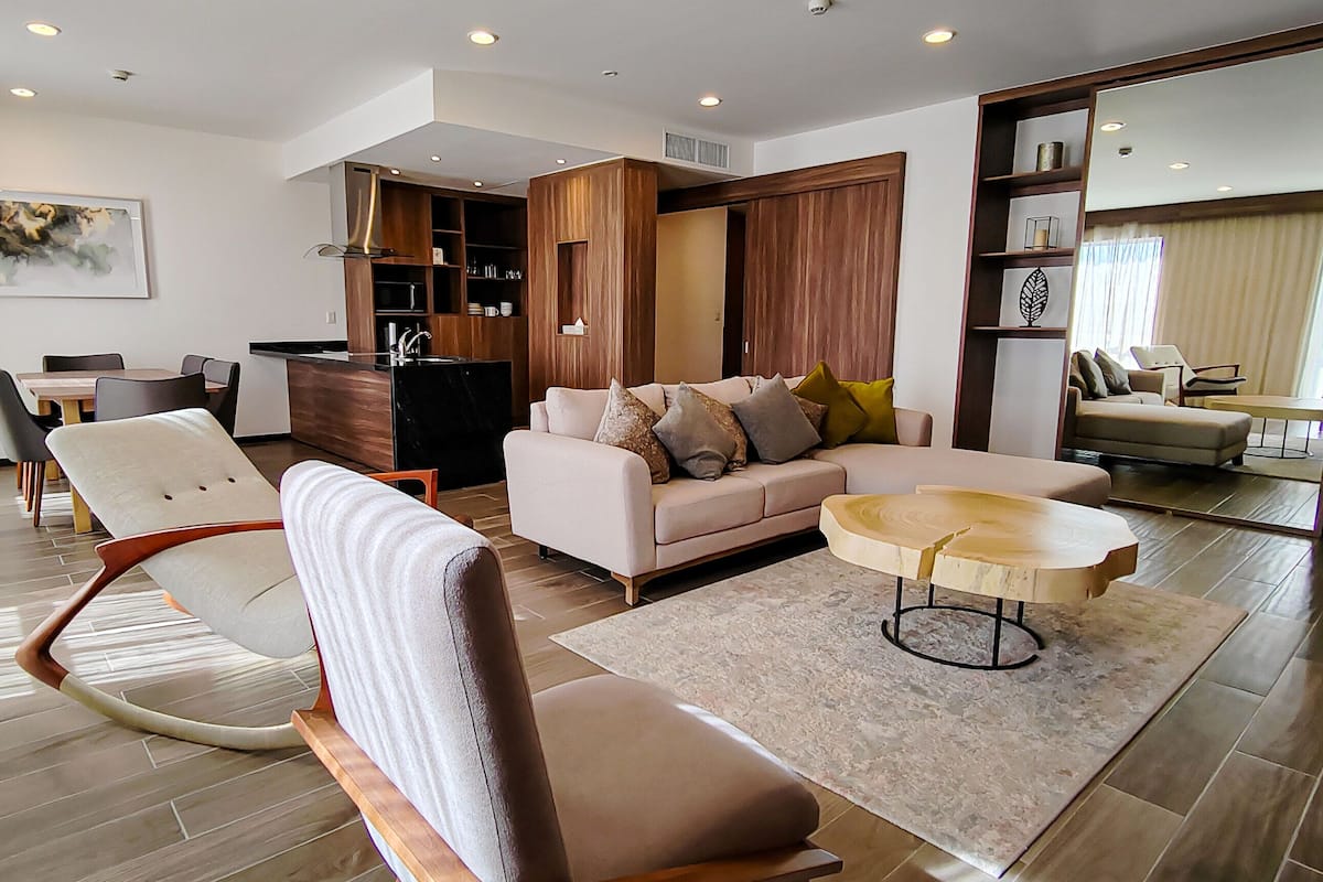 Presidential Suite, Multiple Beds, Non Smoking | Living area | 49-inch TV with cable channels