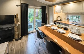 Fridge, stovetop, dishwasher, coffee/tea maker