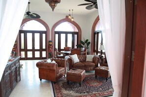 Luxury Bungalow, Ocean View | Living area | Smart TV, fireplace, Netflix, streaming services