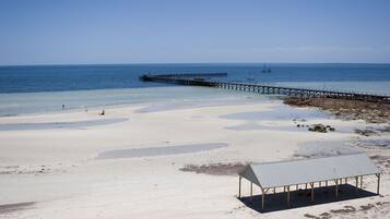 On the beach, white sand