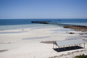 On the beach, white sand
