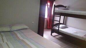 Family Room, Multiple Beds | Individually decorated, individually furnished, blackout drapes - Hotel Brisas del Pacifico (Playas)