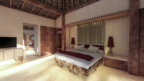 Ein geräumiges Schlafzimmer mit einem großen Bett, einem Fernseher und einem einzigartigen Holz-Kopfteil.