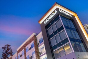 A modern building with a sign reading 'CAMBRIA' at the top.