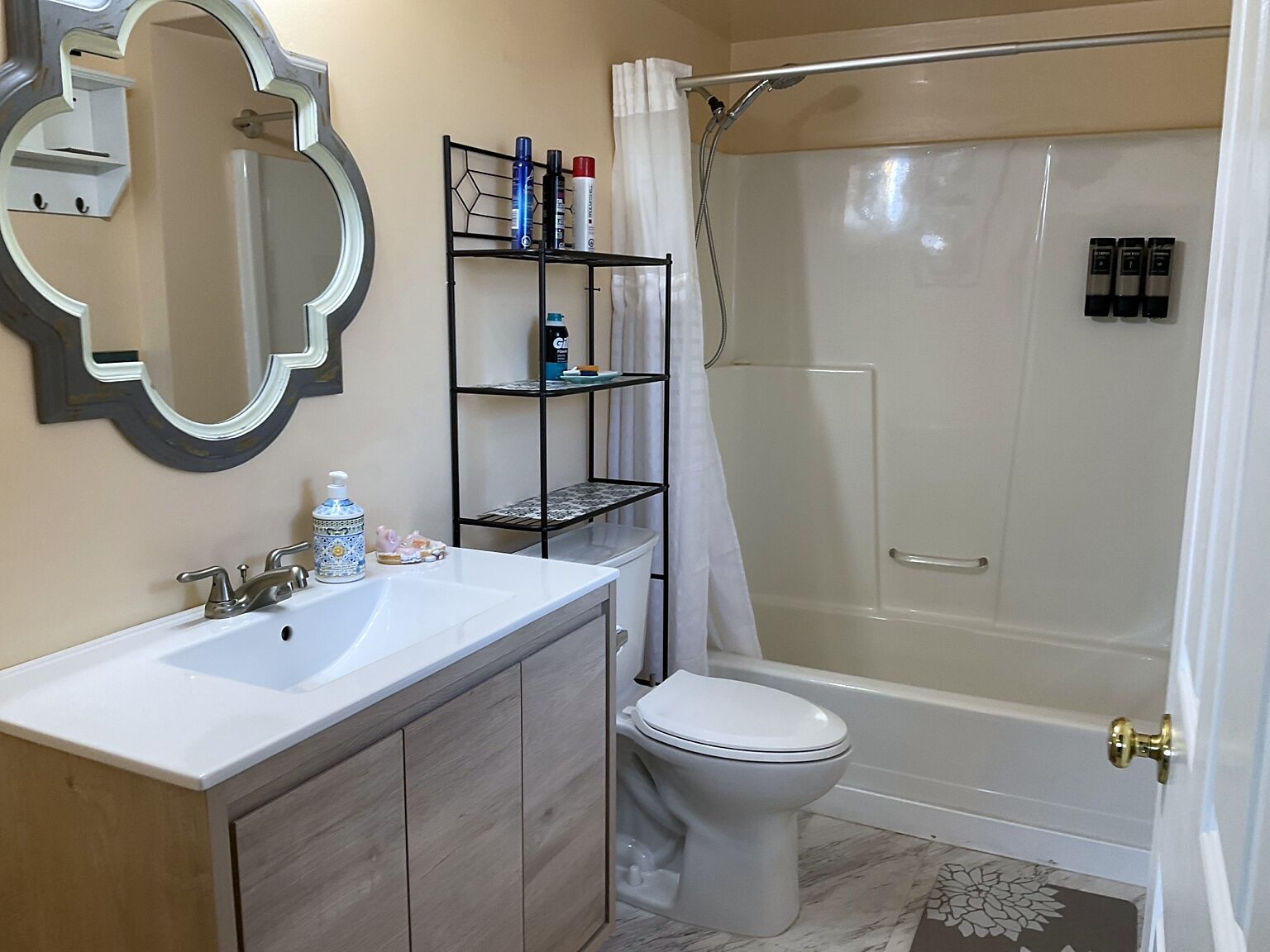 Bathtub, eco-friendly toiletries, hair dryer, towels