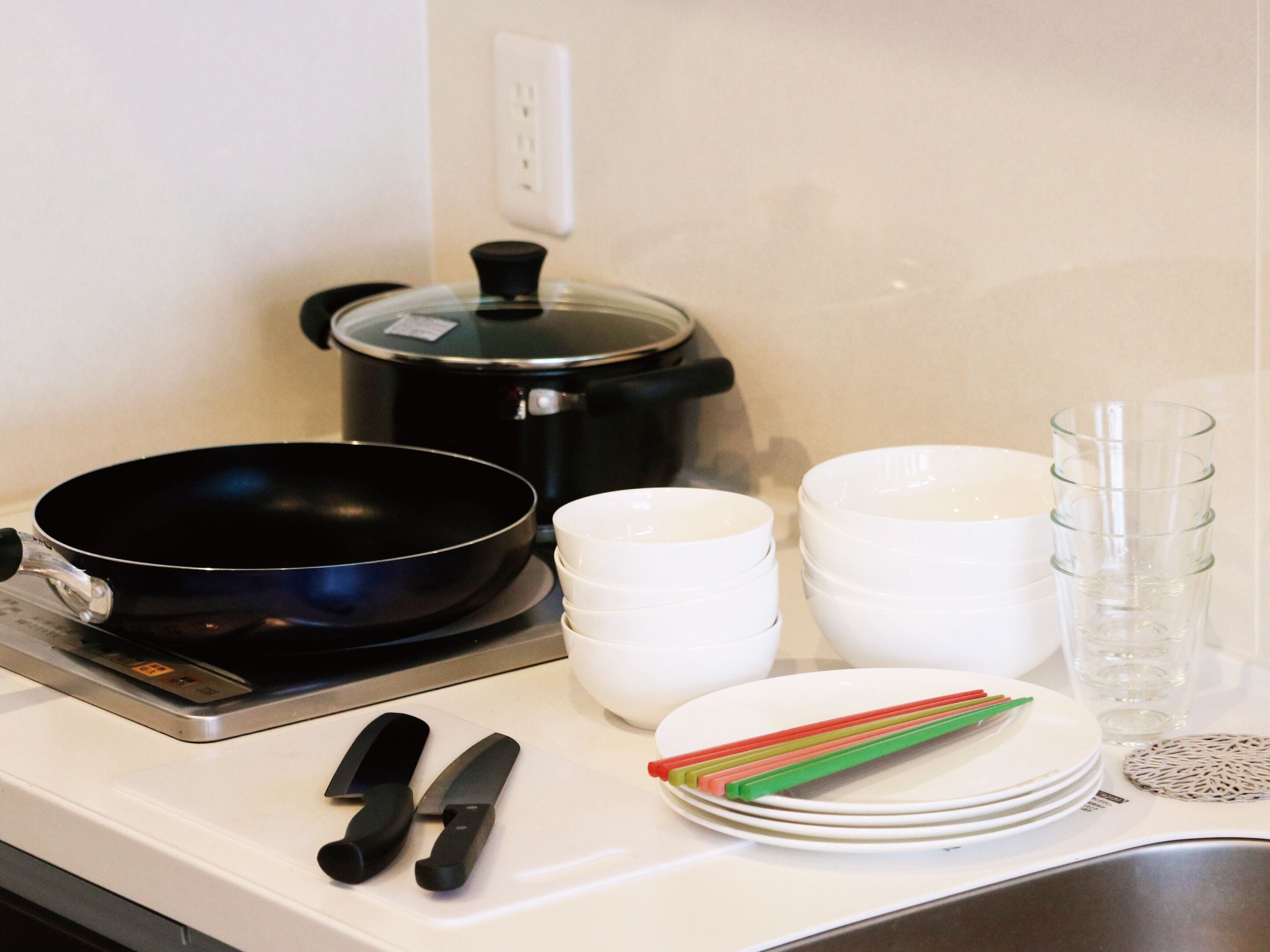 full-sized fridge, microwave, stovetop, electric kettle