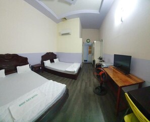 Minibar, desk, laptop workspace, blackout curtains - Ngoc Han Hotel (Tinh Bien)