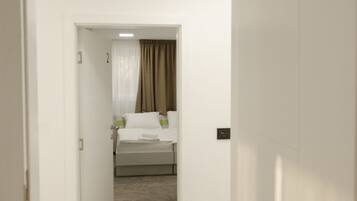 Premium bedding, down duvets, pillow-top beds, desk