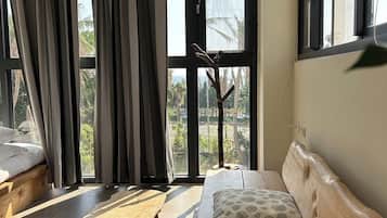 Sea View Squirrel Quad Room | Zona de estar
