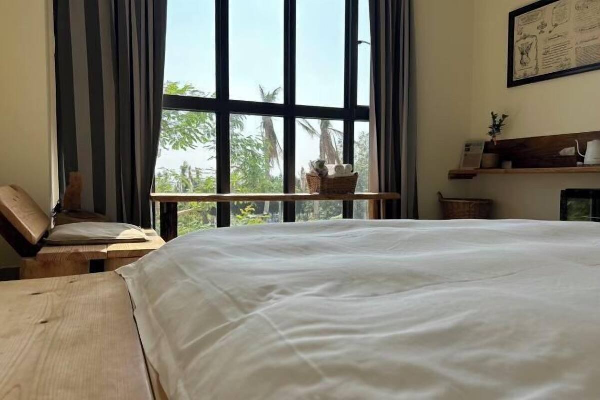 Desk, blackout curtains, bed sheets