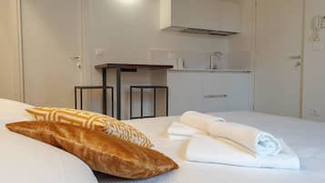 Frette Italian sheets, premium bedding, down duvets, blackout curtains
