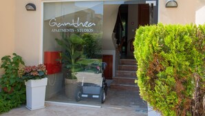 A building entrance with a sign reading "Giantree Apartments - Studios". - Gianthea Studios and Apt (Chania)