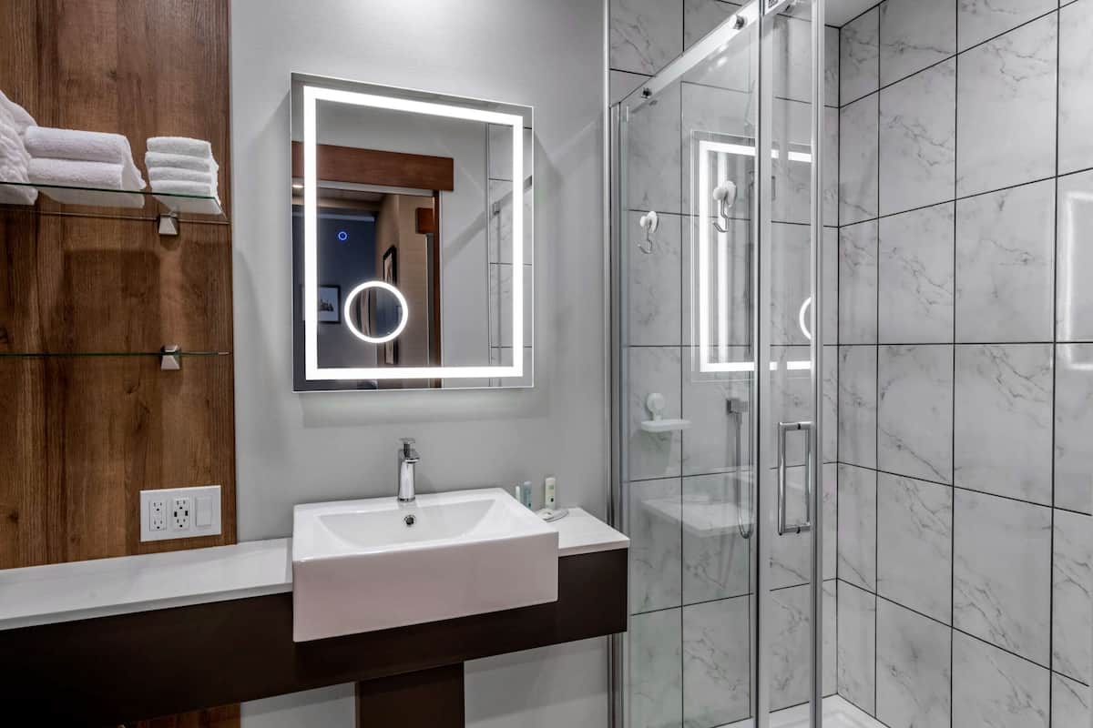 shower, hair dryer, heated floors, towels