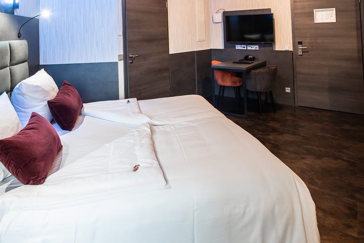 junior double room, 1 king bed | 1 bedroom, desk, laptop workspace, blackout curtains