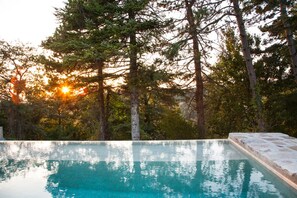 Seasonal outdoor pool, pool loungers
