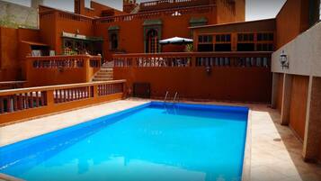 Outdoor pool, sun loungers
