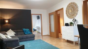 Apartment | Living room | 120-cm LED TV with cable channels, TV