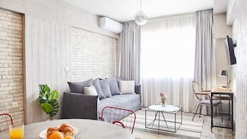 Walk Ancient Athens from this 1BDR near Acropolis! from this 1BDR near Acropolis | Living room | 28-inch Smart TV with digital channels, TV