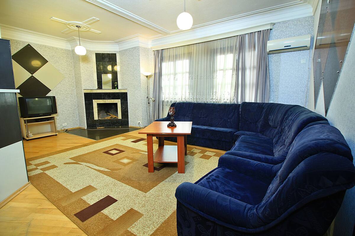 Family Suite, 2 Bedrooms | Living area | Fireplace
