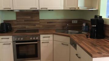 Apartemen | Dapur pribadi | Lemari es, oven, kompor, dan mesin pencuci piring