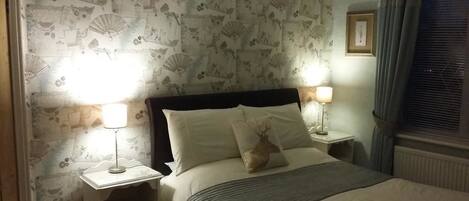 Familien-Suite, Nichtraucher, Gartenblick | Individuell eingerichtet, Bügeleisen/Bügelbrett, kostenloses WLAN