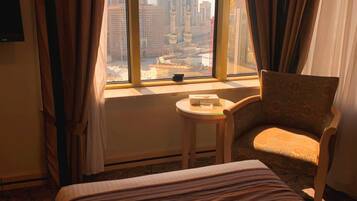 Premium bedding, minibar, laptop workspace, free cribs/infant beds