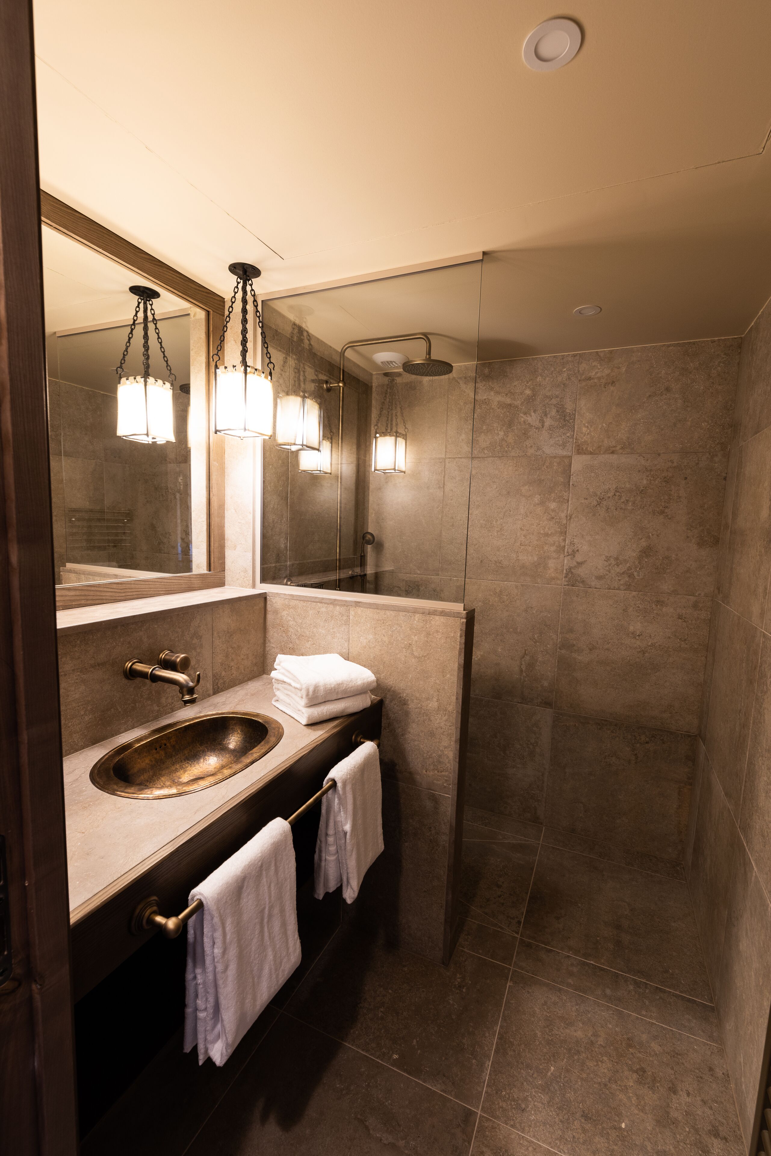 family room | bathroom | shower, rainfall showerhead, free toiletries, hair dryer