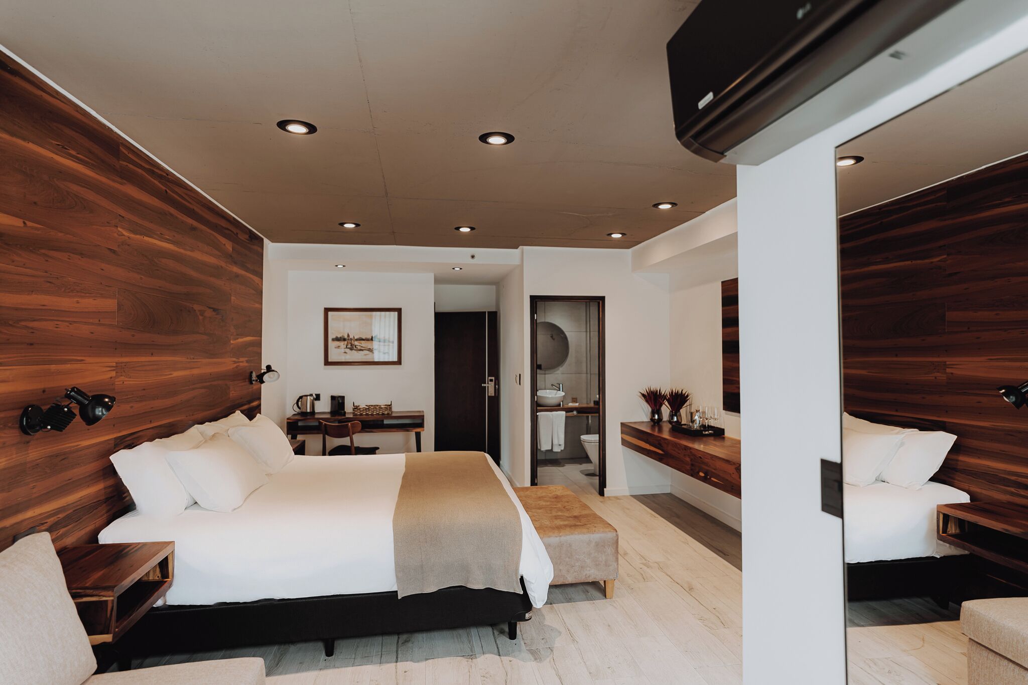 Premium bedding, down comforters, pillowtop beds, minibar