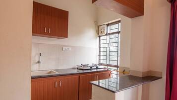 Dishwasher, coffee/tea maker, cookware/dishes/utensils