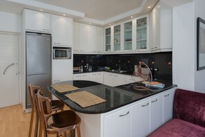 Fridge, microwave, dishwasher, electric kettle