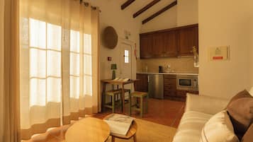 Habitación familiar | Área de sala de estar | Televisión de pantalla plana