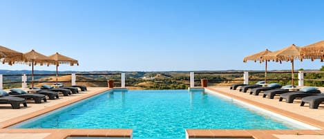 2 outdoor pools, pool umbrellas, sun loungers