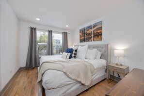 4 bedrooms, premium bedding, iron/ironing board, travel crib