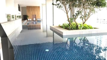 Indoor pool, outdoor pool, open 9:00 AM to 9:00 PM, pool umbrellas