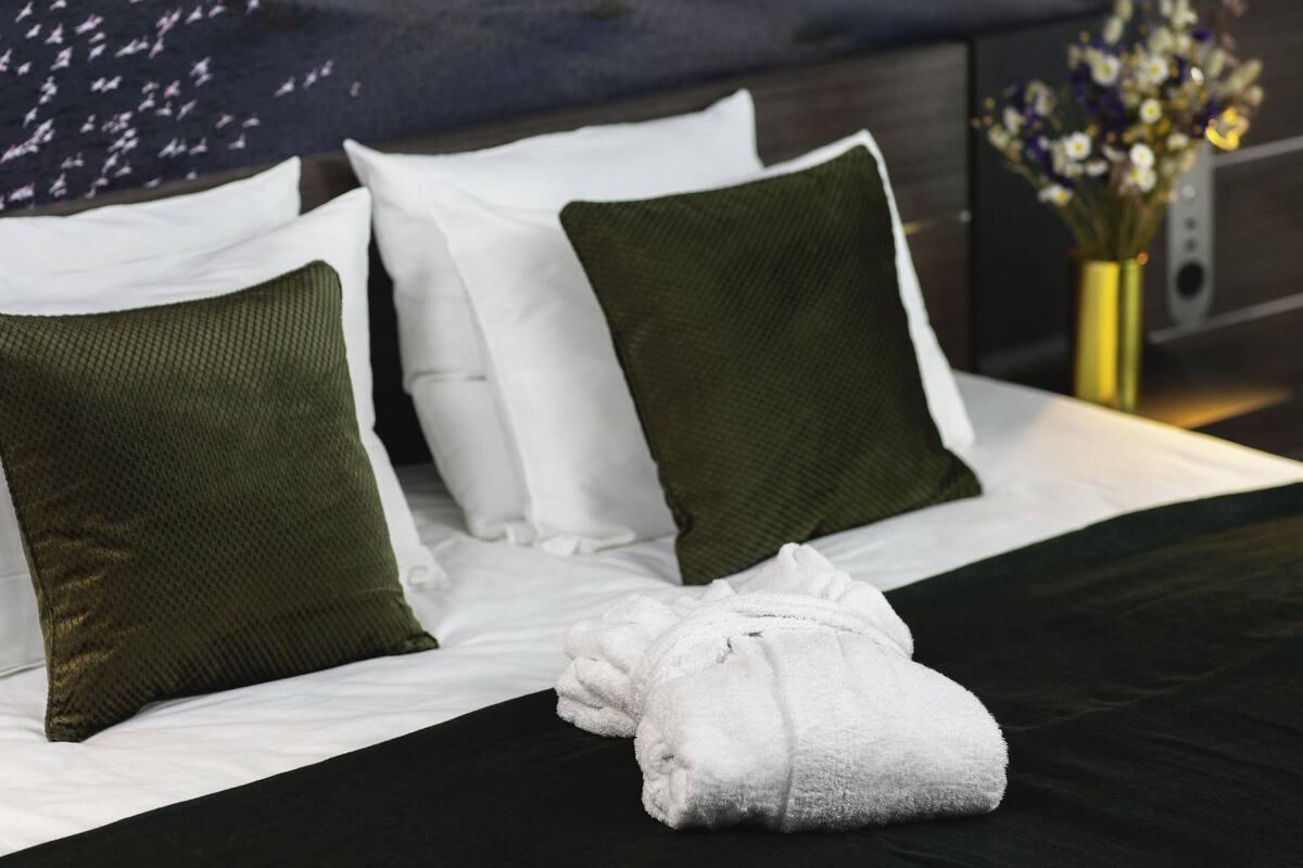 Hypo-allergenic bedding available, memory foam beds, in-room safe