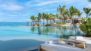 3 outdoor pools, open 6:00 AM to 10:00 PM, cabanas (surcharge)
