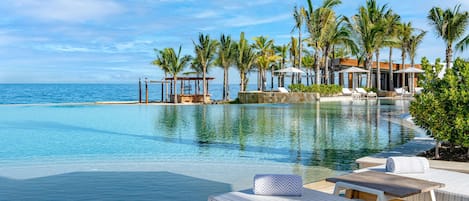 3 outdoor pools, open 6:00 AM to 10:00 PM, cabanas (surcharge)