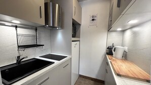 Private kitchen - ELAN 19 - Village center apartment, near the aquatic center - Parking (La Clusaz)