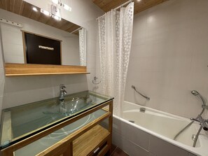 Bathtub, hair dryer