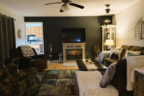 Smart TV, fireplace, DVD player, books